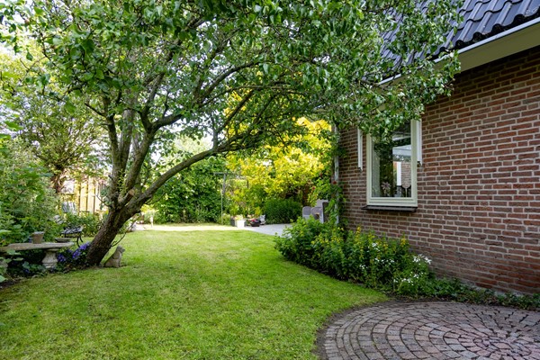 Te koop: Fantastisch vrijstaand woonhuis met 4 slaapkamers én mogelijkheid tot ruime garage!
 Tuin 1.jpg